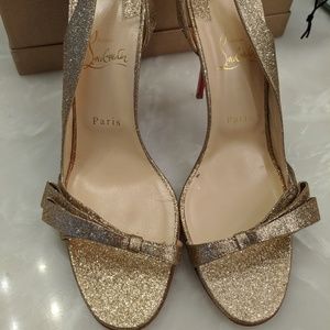 Worn once, glitter gold Louboutin heels!
